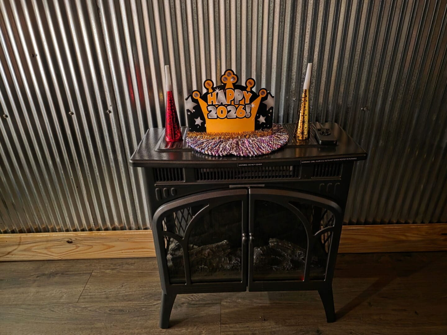 New Year 2026 decoration on a fireplace.